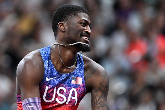 US' athlete Cordell Tinch celebrates after winning the men's 110m hurdles final during the World Athletics Championships in Tokyo on September 16, 2025. (Photo by Jewel SAMAD / AFP)