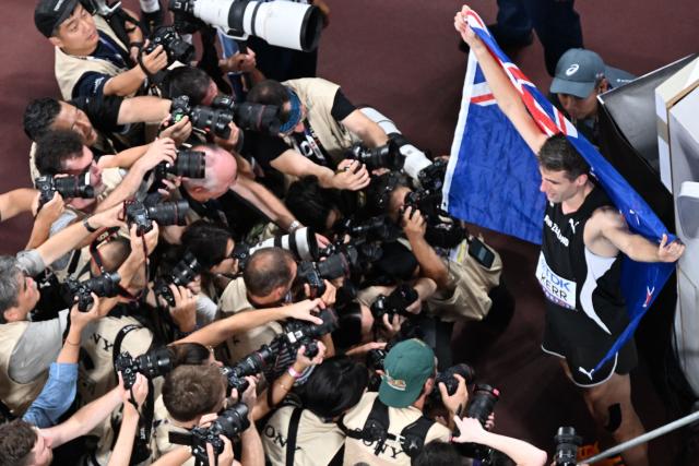 Gold medallist New Zealand's athlete Hamish Kerr celebrates after winning the men's high jump final during the World Athletics Championships in Tokyo on September 16, 2025. (Photo by Antonin THUILLIER / AFP)