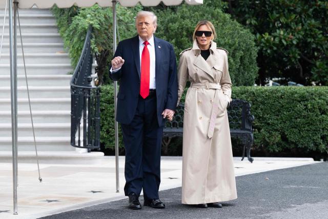 US President Donald Trump and First Lady Melania Trump walk to Marine One prior to departing from the South Lawn of the White House in Washington, DC, September 16, 2025, as they travel to the UK. Trump is heading to the UK for a State Visit. (Photo by SAUL LOEB / AFP)