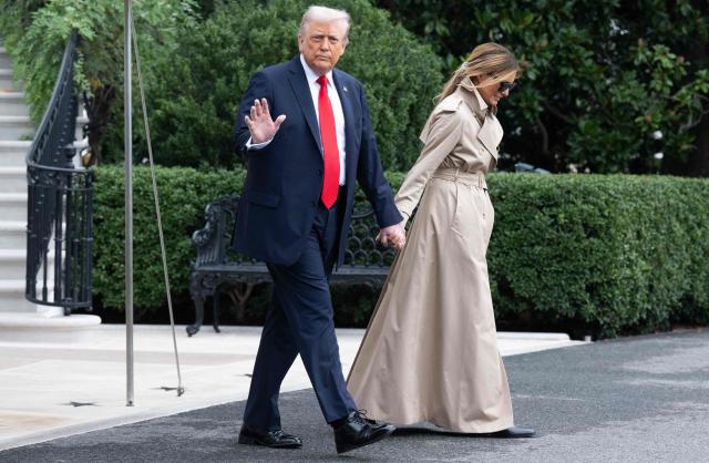 US President Donald Trump and First Lady Melania Trump walk to Marine One prior to departing from the South Lawn of the White House in Washington, DC, September 16, 2025, as they travel to the UK. Trump is heading to the UK for a State Visit. (Photo by SAUL LOEB / AFP)