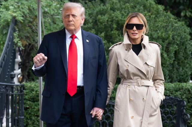 US President Donald Trump and First Lady Melania Trump walk to Marine One prior to departing from the South Lawn of the White House in Washington, DC, September 16, 2025, as they travel to the UK. Trump is heading to the UK for a State Visit. (Photo by SAUL LOEB / AFP)