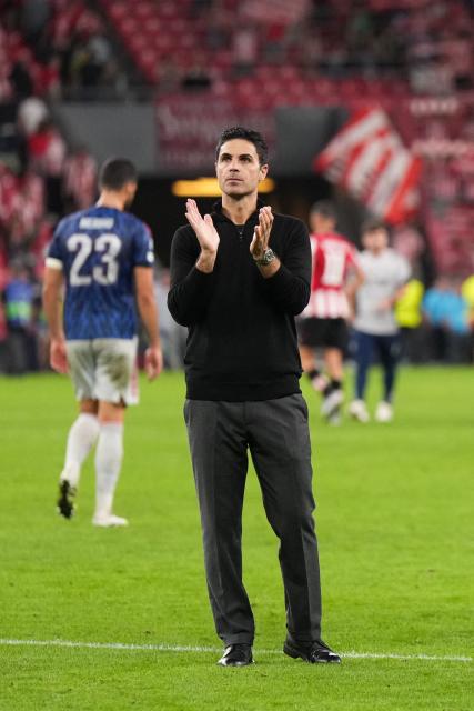Arsenal's Spanish coach Mikel Arteta celebrates victoryat the end of the UEFA Champions League first round day 1 football match between Athletic Club Bilbao and Arsenal at the San Mames stadium in Bilbao on September 16, 2025. Arsenal won 0-2. (Photo by Cesar MANSO / AFP)