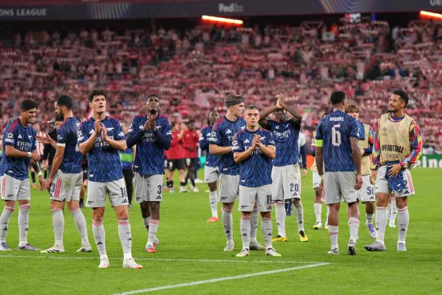 Arsenal players celebrate victory at the end of the UEFA Champions League first round day 1 football match between Athletic Club Bilbao and Arsenal at the San Mames stadium in Bilbao on September 16, 2025. Arsenal won 0-2. (Photo by Cesar MANSO / AFP)