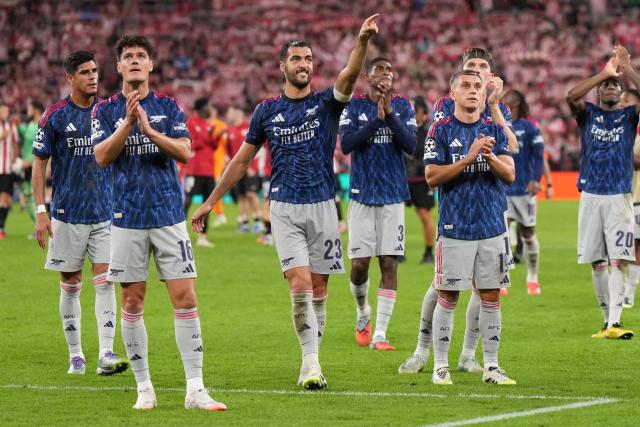 Arsenal players celebrate victory at the end of the UEFA Champions League first round day 1 football match between Athletic Club Bilbao and Arsenal at the San Mames stadium in Bilbao on September 16, 2025. Arsenal won 0-2. (Photo by Cesar MANSO / AFP)