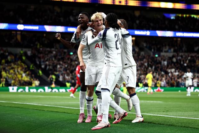 Tottenham Hotspur's Swedish midfielder #15 Lucas Bergvall (2L) celebrates the team's first goal during the UEFA Champions League football league stage match between Tottenham Hotspur and Villarreal at the Tottenham Hotspur Stadium in London, on September 16, 2025. (Photo by HENRY NICHOLLS / AFP)