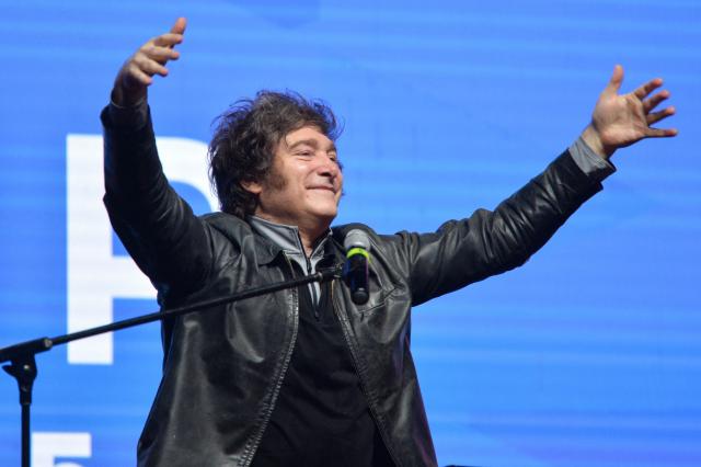 Argentina's President Javier Milei gestures during a meeting with young people from the Industrial Entrepreneurs Forum of Paraguay (FEIP) at the headquarters of the National Sports Secretariat (SND) in Asuncion on September 16, 2025. (Photo by Daniel DUARTE / AFP)