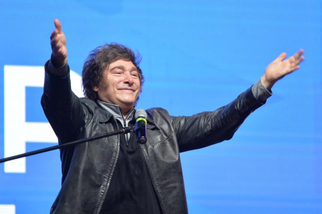Argentina's President Javier Milei gestures during a meeting with young people from the Industrial Entrepreneurs Forum of Paraguay (FEIP) at the headquarters of the National Sports Secretariat (SND) in Asuncion on September 16, 2025. (Photo by Daniel DUARTE / AFP)