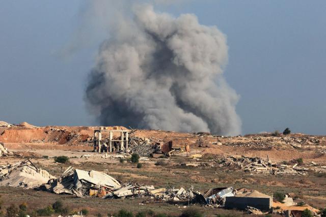 This picture taken from a position at Israel's border with the Gaza Strip shows smoke billowing during an Israeli strike on the besieged Palestinian territory on September 17, 2025. Israel launched its ground assault on Gaza City before dawn on September 16, shortly after the US Secretary of State's visit expressing robust support for the offensive, while a United Nations probe charged Israel with committing "genocide" in the Palestinian territory and accused its Prime Minister and other top officials of incitement. (Photo by Jack GUEZ / AFP)