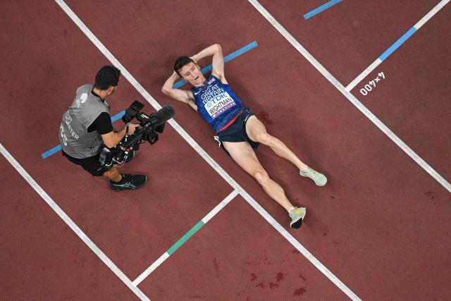 Britain's athlete Jake Wightman reacts after competing in the men's 1500m final during the World Athletics Championships in Tokyo on September 17, 2025. (Photo by Antonin THUILLIER / AFP)