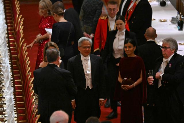 Nvidia CEO Jensen Huang (C) attends a State Banquet at Windsor Castle, in Windsor, on September 17, 2025, during the second State Visit of US President Donald Trump. US President Donald Trump arrived in Britain for an unprecedented second State Visit, with the UK government rolling out a royal red carpet welcome to win over the mercurial leader. (Photo by ANDREW CABALLERO-REYNOLDS / POOL / AFP)