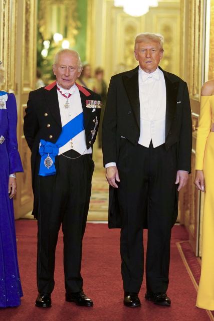 (L-R) Britain's King Charles III and US President Donald Trump pose for a photo as they attend a State Banquet at Windsor Castle, in Windsor, on September 17, 2025, during the US President's second State Visit. US President Donald Trump arrived in Britain for an unprecedented second State Visit, with the UK government rolling out a royal red carpet welcome to win over the mercurial leader. (Photo by Aaron Chown / POOL / AFP)