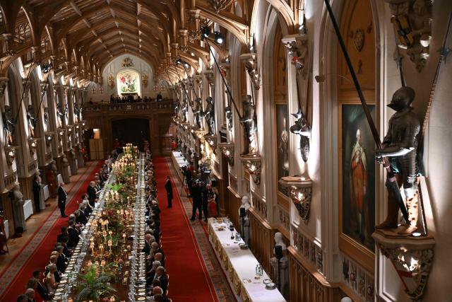 US President Donald Trump (centre left) delivers a speech at a State Banquet at Windsor Castle, in Windsor, on September 17, 2025, during the US President's second State Visit. US President Donald Trump arrived in Britain for an unprecedented second State Visit, with the UK government rolling out a royal red carpet welcome to win over the mercurial leader. (Photo by ANDREW CABALLERO-REYNOLDS / POOL / AFP)