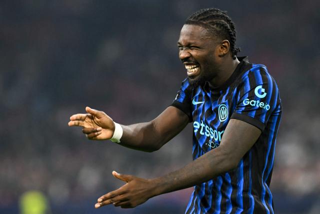 Inter Milan's French forward #09 Marcus Thuram celebrates scoring his team's second goal during the UEFA Champions League first round day 1 football match between Ajax Amsterdam and Inter Milan, at the Johan Cruijff ArenA in Amsterdam, on September 17, 2025. (Photo by NICOLAS TUCAT / AFP)