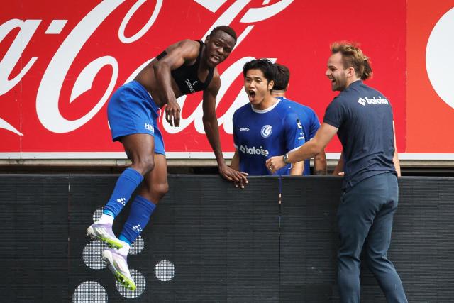 KAA Gent's Ivorian forward #45 Hyllarion Goore (L) celebrates after scoring a goal  during the Belgian Pro League Belgian Pro League football match between KAA Gent and Club Brugge at the KAA Stadium in Ghent on August 31, 2025. (Photo by KURT DESPLENTER / BELGA / AFP) / Belgium OUT
