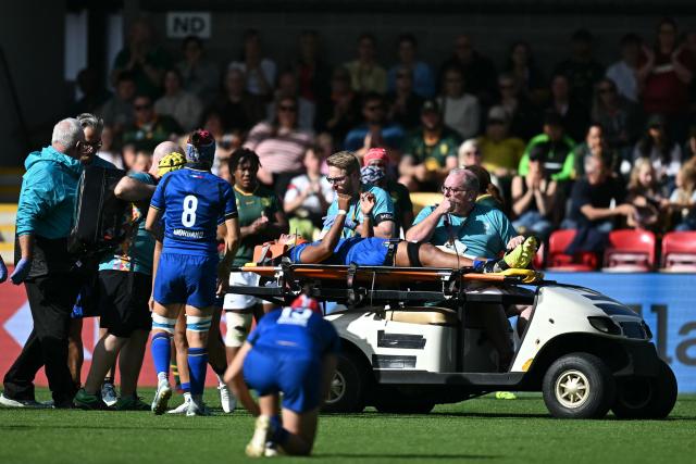 Italy's lock Sara Tounesi is taken off on a stretcher after picking up an injury during the Women’s Rugby World Cup pool D match between Italy and South Africa at York Community Stadium, York, northern England, on August 31, 2025. (Photo by Paul ELLIS / AFP)