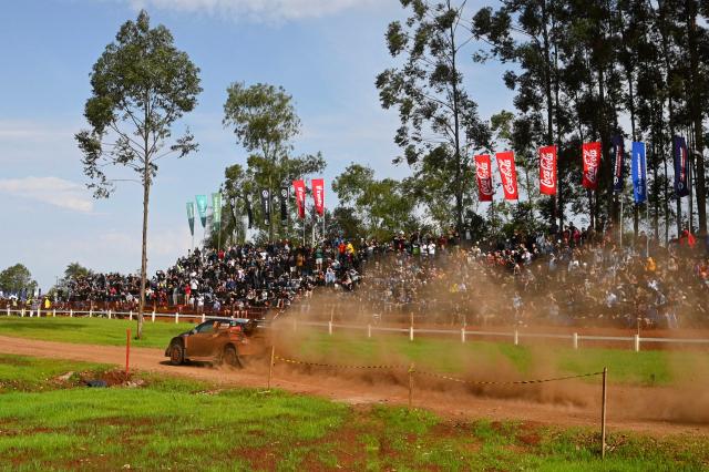 Japanese driver Takamoto Katsuta and Irish co-driver Aaron Johnston compete in their Toyota GR Yaris Rally1 during the Trinidad stage of the WRC Rally Paraguay, 10th stage of the FIA World Rally Championship (WRC), in Trinidad, near Encarnacion, Paraguay, on August 31, 2025. (Photo by Luis ROBAYO / AFP)