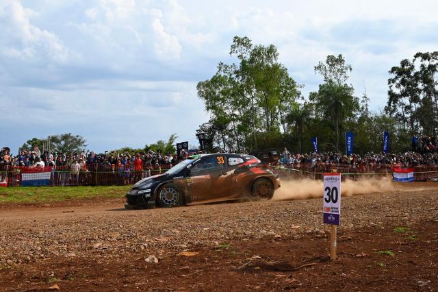 British driver Elfyn Evans and co-driver Scott Martin compete in their Toyota GR Yaris Rally1 during the Trinidad stage of the WRC Rally Paraguay, 10th stage of the FIA World Rally Championship (WRC), in Trinidad, near Encarnacion, Paraguay on August 31, 2025. (Photo by Luis ROBAYO / AFP)