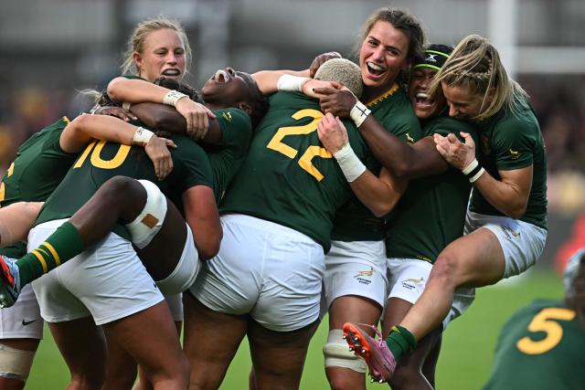 South Africa's players celebrate their win on the final whistle in the Women’s Rugby World Cup pool D match between Italy and South Africa at York Community Stadium, York, northern England, on August 31, 2025. South Africa won the game 29-24. (Photo by Paul ELLIS / AFP)