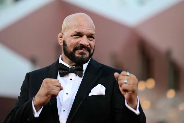TOPSHOT - US former UFC fighter Mark Kerr attends the red carpet of the movie "The Smashing Machine" presented in competition at the 82nd International Venice Film Festival, at Venice Lido on Sepember 1, 2025. (Photo by Tiziana FABI / AFP)