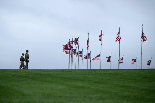 Members of the National Guard patrol the National Mall on September 17, 2025, in Washington, DC. US President Donald Trump on September 15 signed an order sending National Guard troops to the city of Memphis, in the latest stage of his crime crackdown that critics have branded authoritarian. Trump said the task force would be a "replica" of the one he sent into the capital Washington in August. (Photo by Brendan Smialowski / AFP)