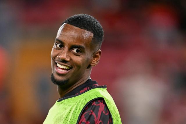 Liverpool's Swedish striker #09 Alexander Isak smiles prior to the UEFA Champions League first round football match between Liverpool and Atletico Madrid at Anfield in Liverpool, north west England on September 17, 2025. (Photo by Oli SCARFF / AFP)