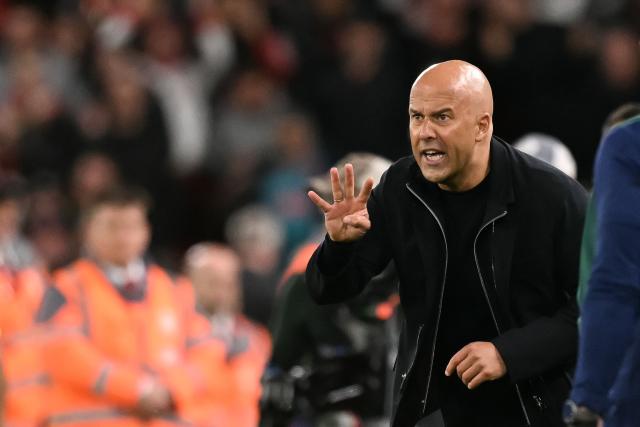 Liverpool's Dutch manager Arne Slot gestures during the UEFA Champions League first round football match between Liverpool and Atletico Madrid at Anfield in Liverpool, north west England on September 17, 2025. (Photo by Oli SCARFF / AFP)
