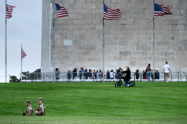 Members of the National Guard patrol the National Mall on September 17, 2025, in Washington, DC. US President Donald Trump on September 15 signed an order sending National Guard troops to the city of Memphis, in the latest stage of his crime crackdown that critics have branded authoritarian. Trump said the task force would be a "replica" of the one he sent into the capital Washington in August. (Photo by Brendan Smialowski / AFP)