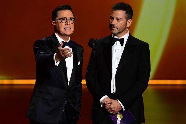 (FILES) Stephen Colbert (L) and Jimmy Kimmel speak onstage during the 71st Emmy Awards at the Microsoft Theatre in Los Angeles on September 22, 2019. Jimmy Kimmel's late-night television show has been taken off air "indefinitely" after the late-night host was criticized for comments about the motives behind the killing of Charlie Kirk, ABC said. 
"Jimmy Kimmel Live will be preempted indefinitely," an ABC spokesperson told AFP. (Photo by Frederic J. BROWN / AFP)