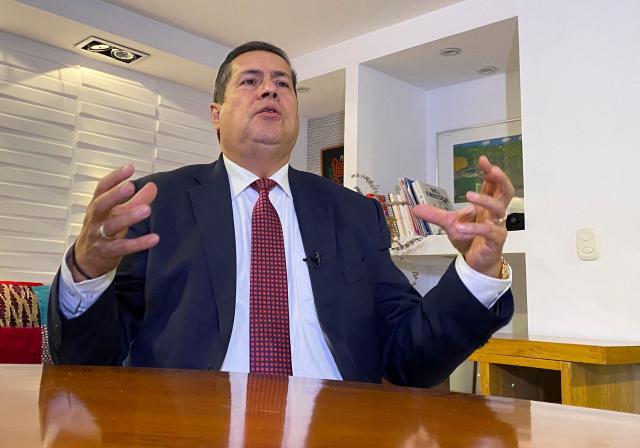 Special Jurisdiction of Peace (JEP) magistrate Camilo Suarez speaks during an AFP interview after the sentence of former FARC guerrilla leaders over kidnapping crimes committed during the Colombian armed conflict, at the JEP headquarters in Bogota on September 17, 2025. (Photo by Juan Restrepo / AFP)