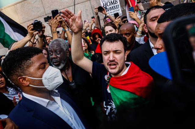 (FILES) Former Columbia University student and pro-Palestinian protest leader Mahmoud Khalil shouts slogans in front of Columbia University after delivering a press conference in New York City on June 22, 2025, two days after his release from US custody. A judge in the southern US state of Louisiana has ordered prominent pro-Palestinian protest leader Mahmoud Khalil to be deported to Algeria or Syria after failing to disclose information on his green card application, according to court documents filed September 17, 2025. (Photo by kena betancur / AFP)