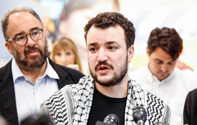 (FILES) Former Columbia Univrsity student Mahmoud Khalil speaks to the press as he arrives at Newark airport in Newark, New Jersey, on June 21, 2025. A judge in the southern US state of Louisiana has ordered prominent pro-Palestinian protest leader Mahmoud Khalil to be deported to Algeria or Syria after failing to disclose information on his green card application, according to court documents filed September 17, 2025. (Photo by kena betancur / AFP)