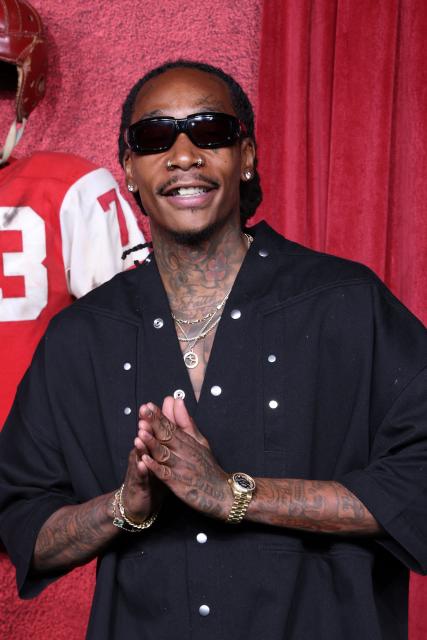 US rapper Wiz Khalifa attends Universal's "Him" premiere at the TCL Chinese theatre in Hollywood, California on September 17, 2025. (Photo by VALERIE MACON / AFP)
