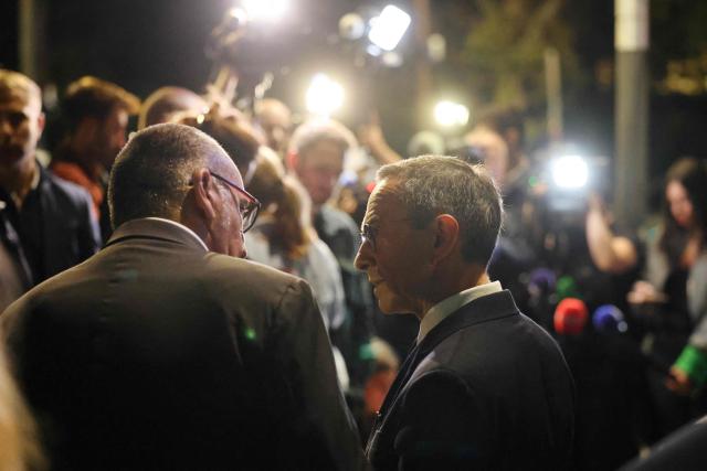 Paris Police Prefect Laurent Nunez (L) listens to France's Minister of the Interior Bruno Retailleau before a media briefing after meeting with police officers at Porte d'Orléans in Paris on September 18, 2025, prior to a day of nationwide strikes and protests called by unions over France's national budget. France is bracing for a day of nationwide protests on September 18, 2025, with a source close to the authorities saying some 800,000 people are expected to take to the streets. In a rare show of unity, trade unions have urged French people to strike in protest at the authorities' "horror show" draft budget designed to reduce France's ballooning debt. (Photo by Ludovic MARIN / AFP)