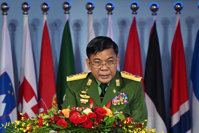 Myanmar’s Defence Minister General Maung Maung Aye speaks during a plenary session of the Xiangshan Forum at the Beijing International Convention Center in Beijing on September 18, 2025. (Photo by GREG BAKER / AFP)