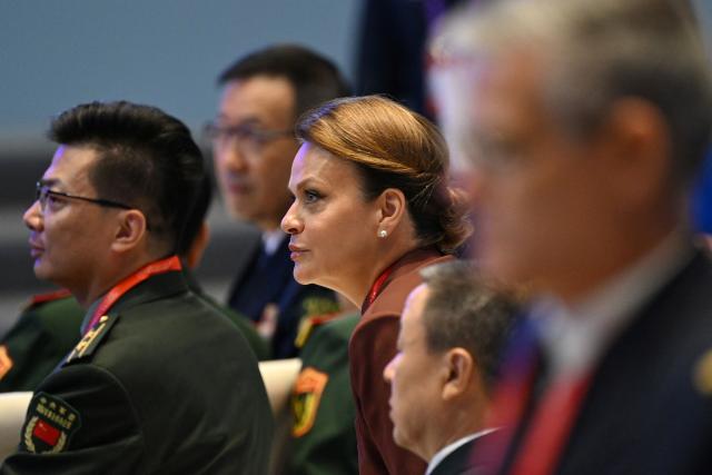 Russian Deputy Defence Minister Anna Tsivileva (C) attends the opening ceremony of the Xiangshan Forum at the Beijing International Convention Center in Beijing on September 18, 2025. (Photo by GREG BAKER / AFP)