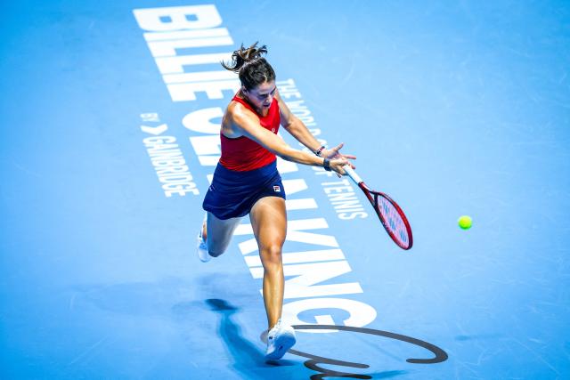 USA's Emma Navarro hits a return against Kazakhstan's Yulia Putintseva during their women’s singles tennis match at the Billie Jean King Cup quarter-finals in Shenzhen, China’s southern Guangdong province on September 18, 2025. (Photo by AFP) / China OUT