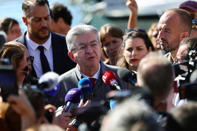France's leftist La France Insoumise (LFI) party leader Jean-Luc Melenchon talks to the press next to LFI MP Manuel Bompard (R) in Marseille, southeastern France, on September 18, 2025, during a day of nationwide strikes and protests called by unions over France's national budget. France is bracing for a day of nationwide protests on September 18, 2025, with a source close to the authorities saying some 800,000 people are expected to take to the streets. In a rare show of unity, trade unions have urged French people to strike in protest at the authorities' "horror show" draft budget designed to reduce France's ballooning debt. (Photo by CLEMENT MAHOUDEAU / AFP)
