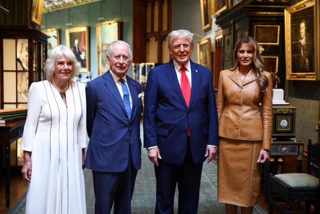 Britain's King Charles III and Britain's Queen Camilla pose for a photo with US President Donald Trump and First Lady Melania Trump as they bid them a formal farewell from Windsor Castle, in Windsor, on September 18, 2025, on the second day of their second State Visit. After the royal hospitality and pageantry, US President Donald Trump's unprecedented second state visit to the UK takes a serious turn on Thursday when he is hosted by Prime Minister Keir Starmer for wide-ranging talks. Starmer will greet Trump on the second day of the visit at his country residence, Chequers, with pressing issues such as trade, Ukraine and Gaza on the agenda. (Photo by Kevin Lamarque / POOL / AFP)