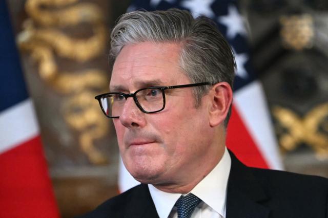 Britain's Prime Minister Keir Starmer attends a joint press conference with US President Donald Trump (unseen) following their meeting at Chequers, in Aylesbury, central England, on September 18, 2025, on the second day of the US President's second State Visit. After the royal hospitality and pageantry, US President Donald Trump's unprecedented second state visit to the UK takes a serious turn on Thursday when he is hosted by Prime Minister Keir Starmer for wide-ranging talks. (Photo by ANDREW CABALLERO-REYNOLDS / AFP)