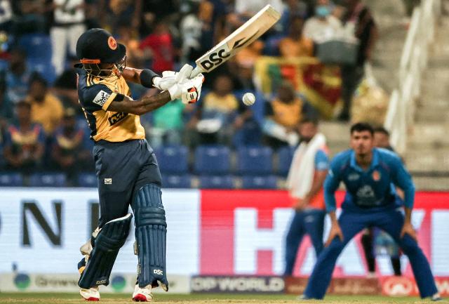 Sri Lanka's Pathum Nissanka plays a shot during the Asia Cup 2025 Twenty20 international cricket match between Afghanistan and Sri Lanka at the Sheikh Zayed Cricket Stadium in Abu Dhabi on September 18, 2025. (Photo by Fadel SENNA / AFP)