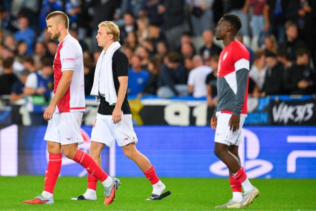 Monaco's players react after loosing the UEFA Champions League first round day 1 football match between Club Brugge and AS Monaco at Jan Breydelstadion stadium, in Bruges, on September 18, 2025. (Photo by JOHN THYS / AFP)