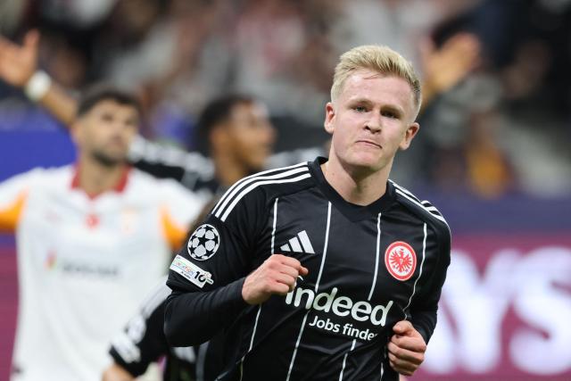 Frankfurt's German forward #09 Jonathan Burkardt celebrates scoring the 3-1 goal during the UEFA Champions League league phase day 1 football match between Eintracht Frankfurt and Galatasaray in Frankfurt, western Germany on September 18, 2025. (Photo by Daniel ROLAND / AFP)