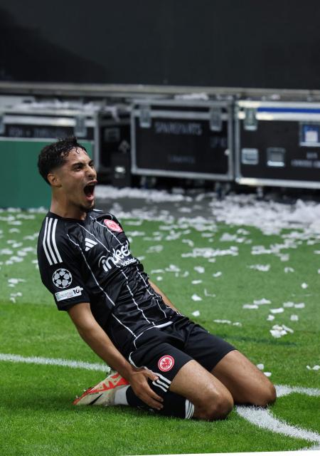 Frankfurt's Turkish forward #42 Can Uzun celebrates during the UEFA Champions League league phase day 1 football match between Eintracht Frankfurt and Galatasaray in Frankfurt, western Germany on September 18, 2025. (Photo by Daniel ROLAND / AFP)