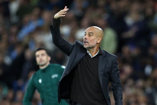 Manchester City's Spanish manager Pep Guardiola gestures during the UEFA Champions League league stage football match between Manchester City and Napoli at the Etihad Stadium in Manchester, north west England, on September 18, 2025. (Photo by Darren Staples / AFP)
