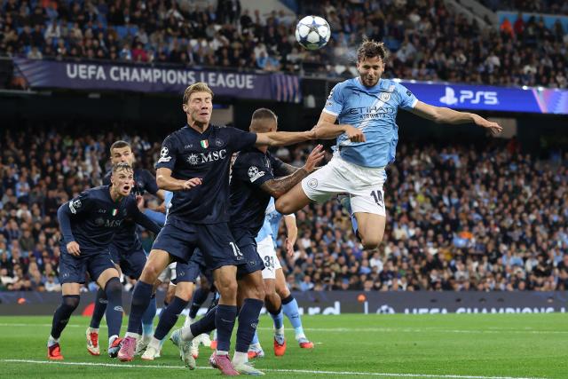 Manchester City's Spanish midfielder #14 Nico Gonzalez heads the ball during the UEFA Champions League league stage football match between Manchester City and Napoli at the Etihad Stadium in Manchester, north west England, on September 18, 2025. (Photo by Darren Staples / AFP)