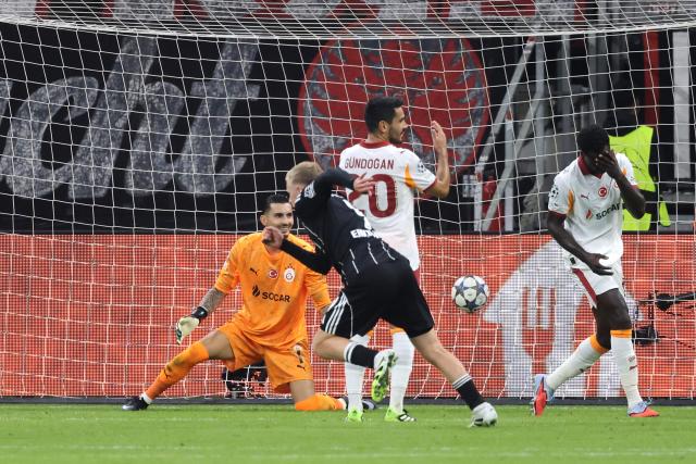 Frankfurt's German forward #09 Jonathan Burkardt (2nd L) celebrates scoring the 4-1 goal during the UEFA Champions League league phase day 1 football match between Eintracht Frankfurt and Galatasaray in Frankfurt, western Germany on September 18, 2025. (Photo by Daniel ROLAND / AFP)