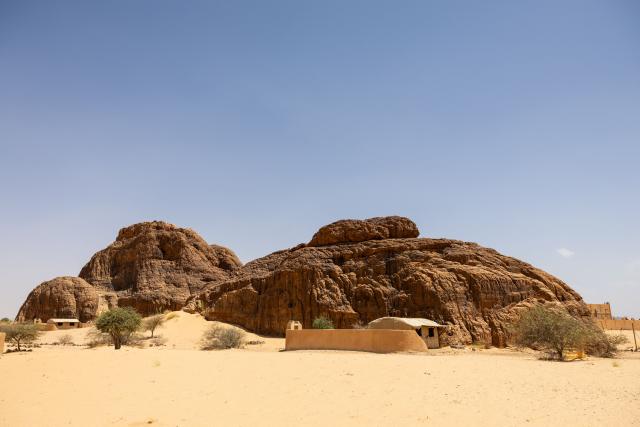 A general view od the Oundoumba camp, in the province of Ennedi Ouest, Chad, on July 10, 2025, built in Fada by the NGO African Parks, designed to accommodate tourists. A five-day scientific mission, conducted at the end of July, thirty kilometers from Fada, brought together Chadian archaeologists and geologists from the universities of N'Djamena and Abeche.
The objective: to lay "the first milestone" in the chronological markers of the ancient occupation of the Ennedi region, the researcher asserts.
The Ennedi Natural and Cultural Reserve (RNCE), created in 2018 in this Chadian province, at the crossroads with Libya and Sudan, is home to a rich archaeological heritage.
Across a sanctuary spanning more than 50,000 square kilometers, tens of thousands of rock engravings and paintings adorn the rock faces.
Following the inscription of the RNCE on the World Heritage List in 2016, the Chadian government entrusted its co-management to the South African NGO African Parks for fifteen years. (Photo by Joris Bolomey / AFP)