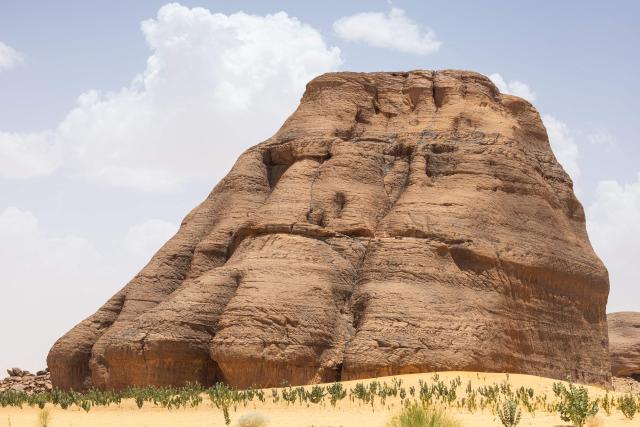 A general view of a sandstone block at the Garoa Hallagana rock art site, in Ennedi Ouest province, Chad, on July 10, 2025. A five-day scientific mission, conducted at the end of July, thirty kilometers from Fada, brought together Chadian archaeologists and geologists from the universities of N'Djamena and Abeche.
The objective: to lay "the first milestone" in the chronological markers of the ancient occupation of the Ennedi region, the researcher asserts.
The Ennedi Natural and Cultural Reserve (RNCE), created in 2018 in this Chadian province, at the crossroads with Libya and Sudan, is home to a rich archaeological heritage.
Across a sanctuary spanning more than 50,000 square kilometers, tens of thousands of rock engravings and paintings adorn the rock faces.
Following the inscription of the RNCE on the World Heritage List in 2016, the Chadian government entrusted its co-management to the South African NGO African Parks for fifteen years. (Photo by Joris Bolomey / AFP)