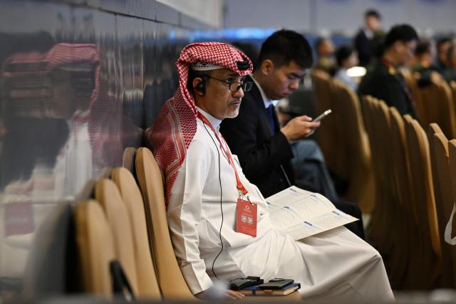 A Saudi Arabian delegate looks on during a plenary session of the Xiangshan Forum in Beijing on September 19, 2025. (Photo by GREG BAKER / AFP)