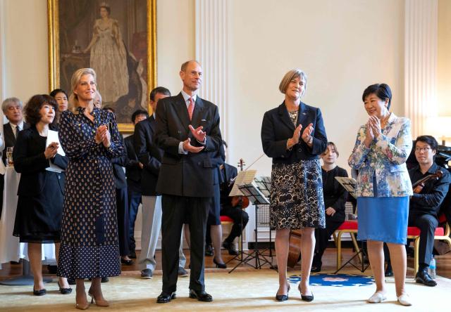 Britain's Prince Edward, Duke of Edinburgh (2nd L) and his wife Princess Sophie, Duchess of Edinburgh (L), Britain's Ambassador to Japan Julia Longbottom (2nd R), and Tokyo Governor Yuriko Koike (R) attend the MUSUBI Initiative reception celebrating the people-to-people ties built between Japan and Britain at the British embassy in Tokyo on September 19, 2025. (Photo by Kazuhiro NOGI / AFP)